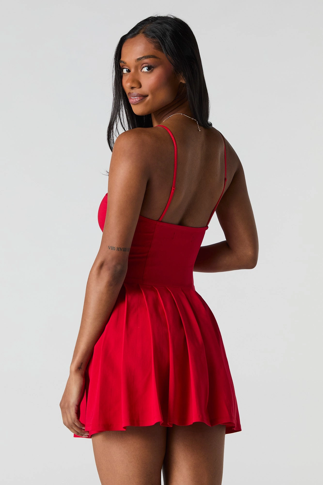 Minirobe corset à plis et rosette
