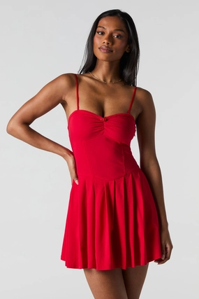 Minirobe corset à plis et rosette