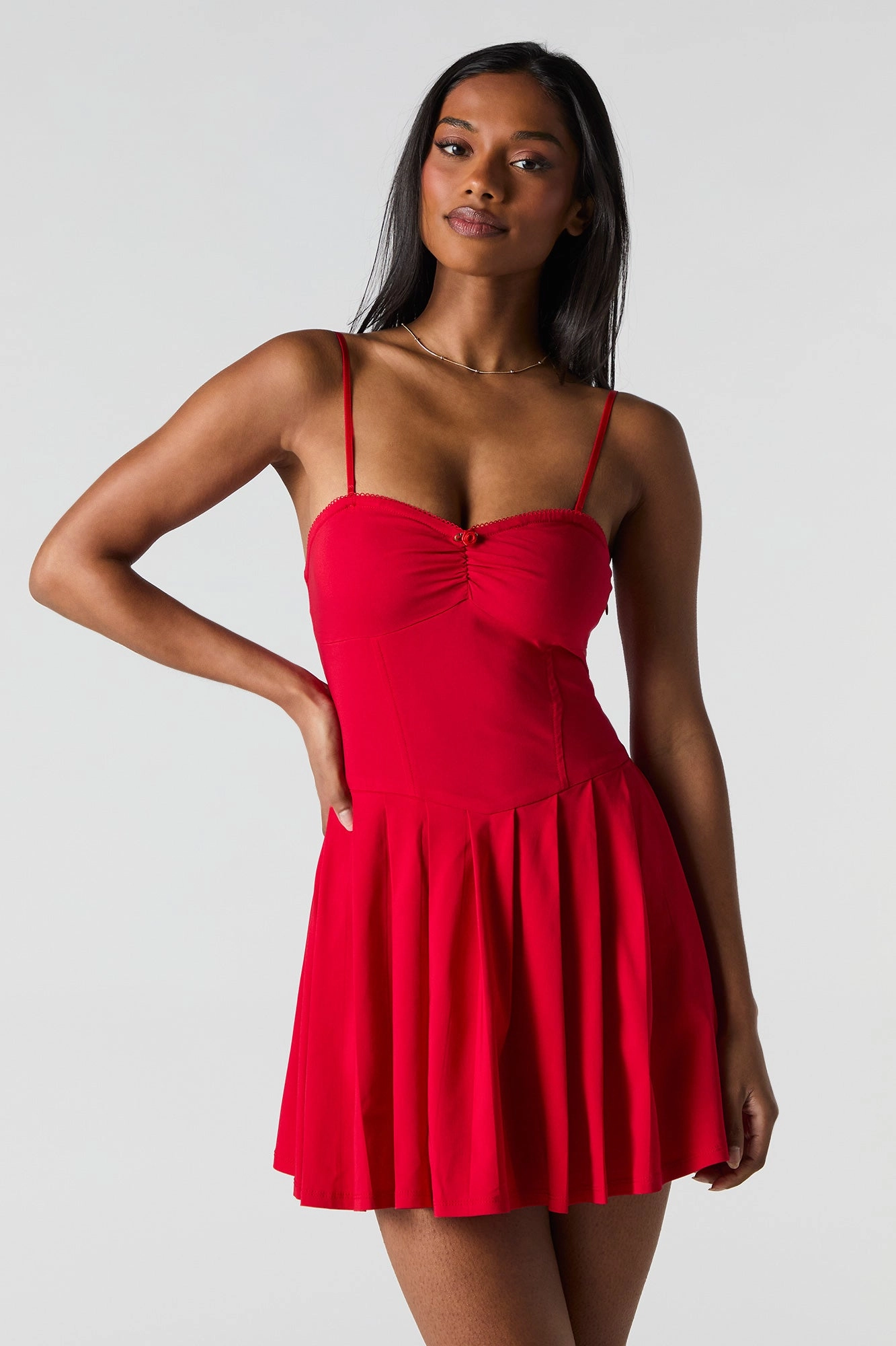 Minirobe corset à plis et rosette