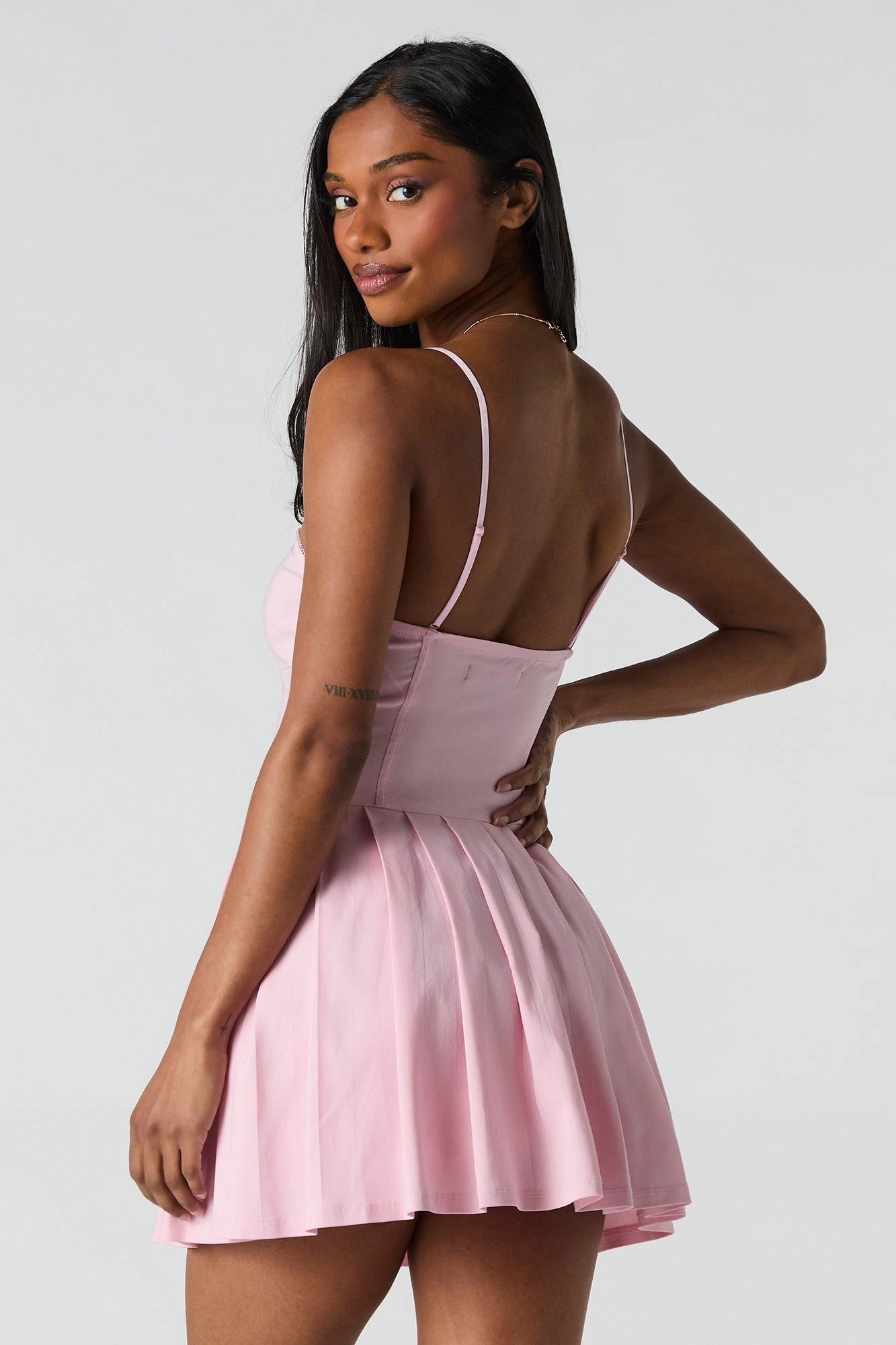Minirobe corset à plis et rosette