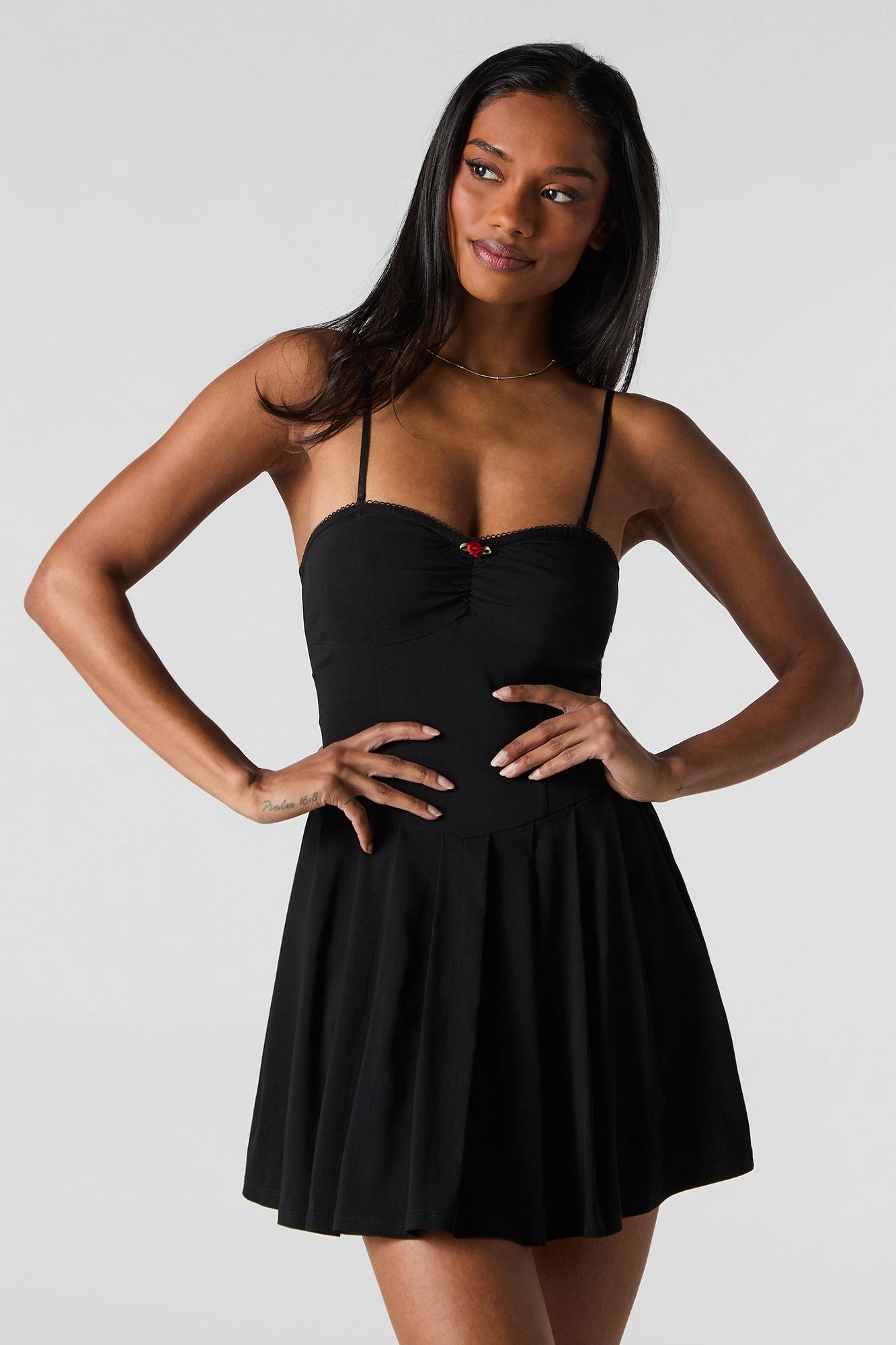 Minirobe corset à plis et rosette